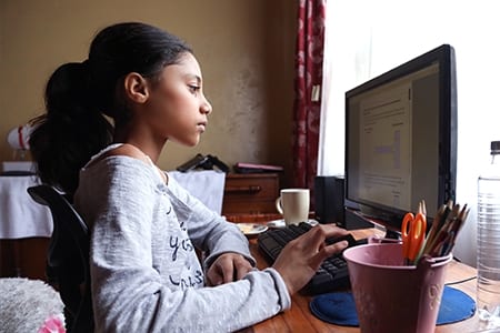 Girl working on computer NWEA