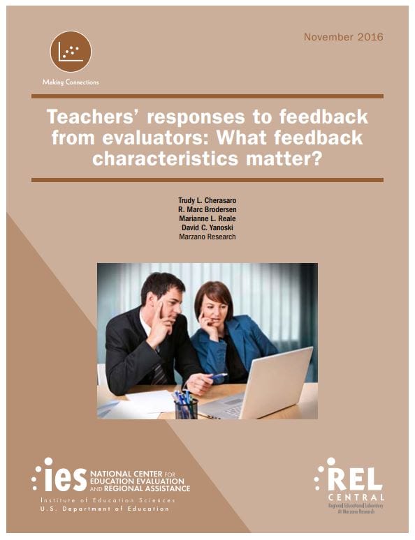 Teachers reviewing feedback on an evaluation